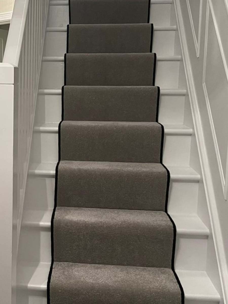 Grey stair runner with black edges